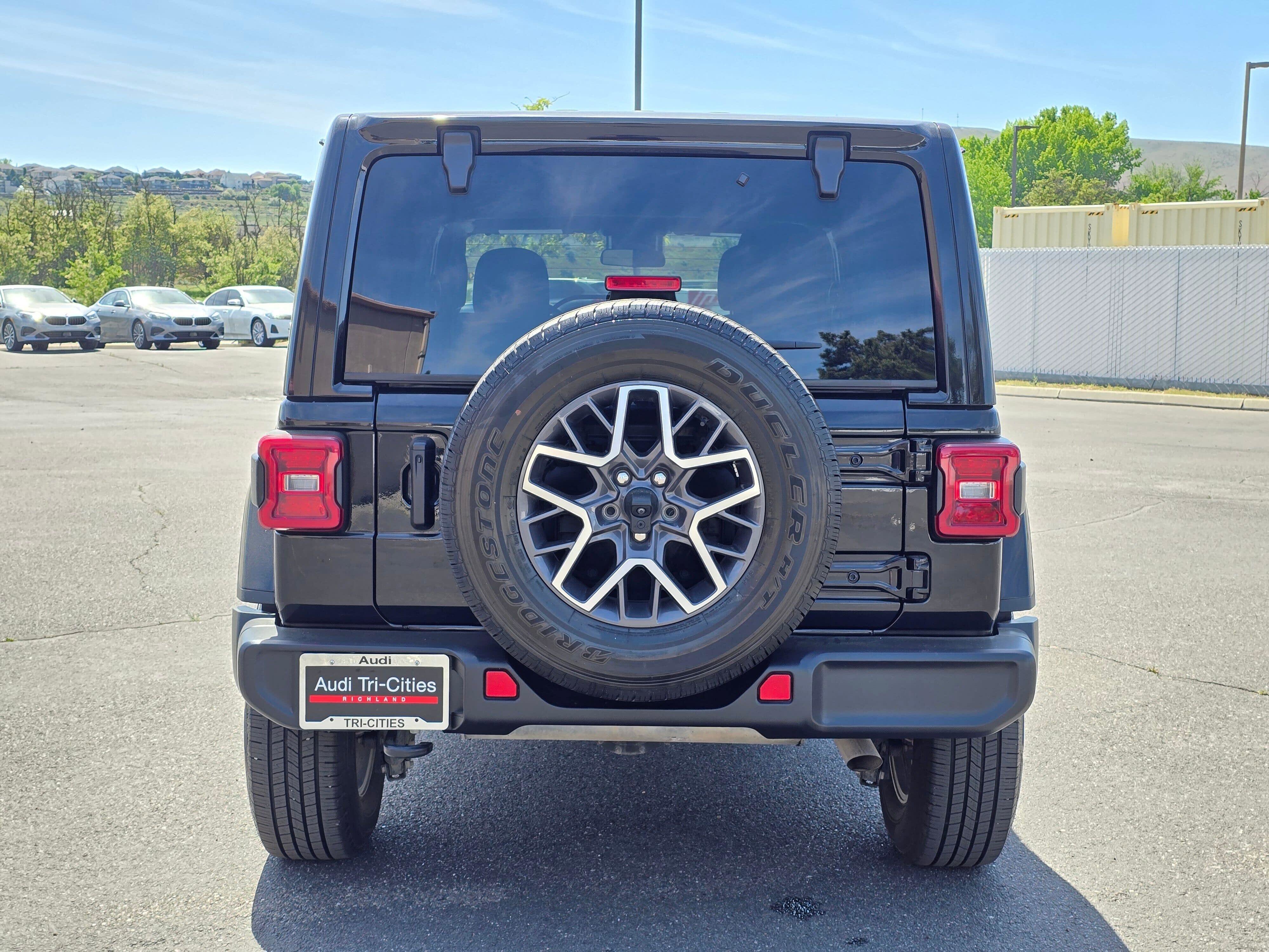 Used 2024 Black Clearcoat Jeep Sahara image 5