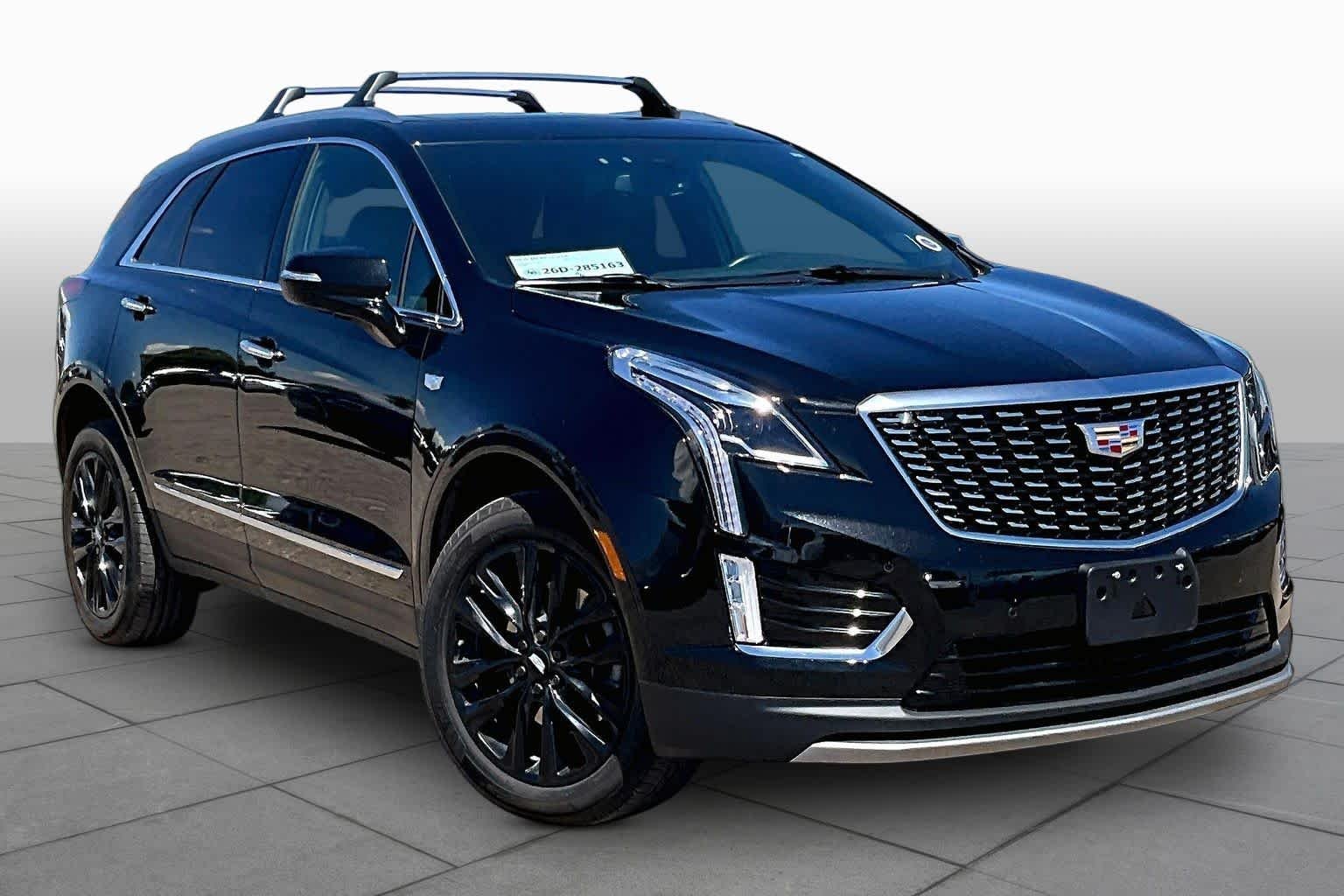 Used 2024 Stellar Black Metallic Cadillac AWD Premium Luxury image 2