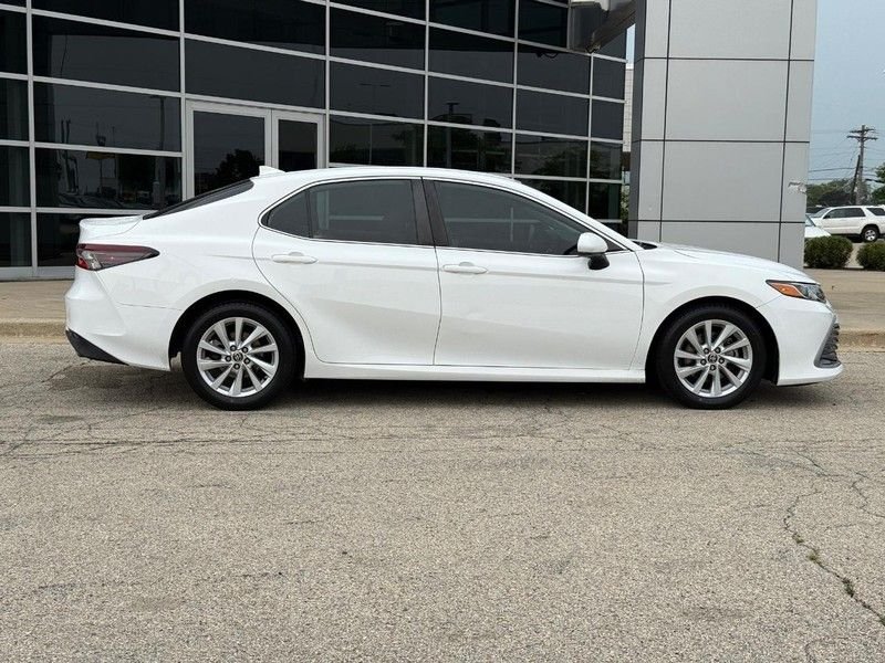 Used 2021 Super White Toyota LE image 2