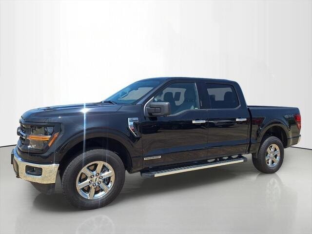 Used 2024 Agate Black Metallic Ford XLT image 1