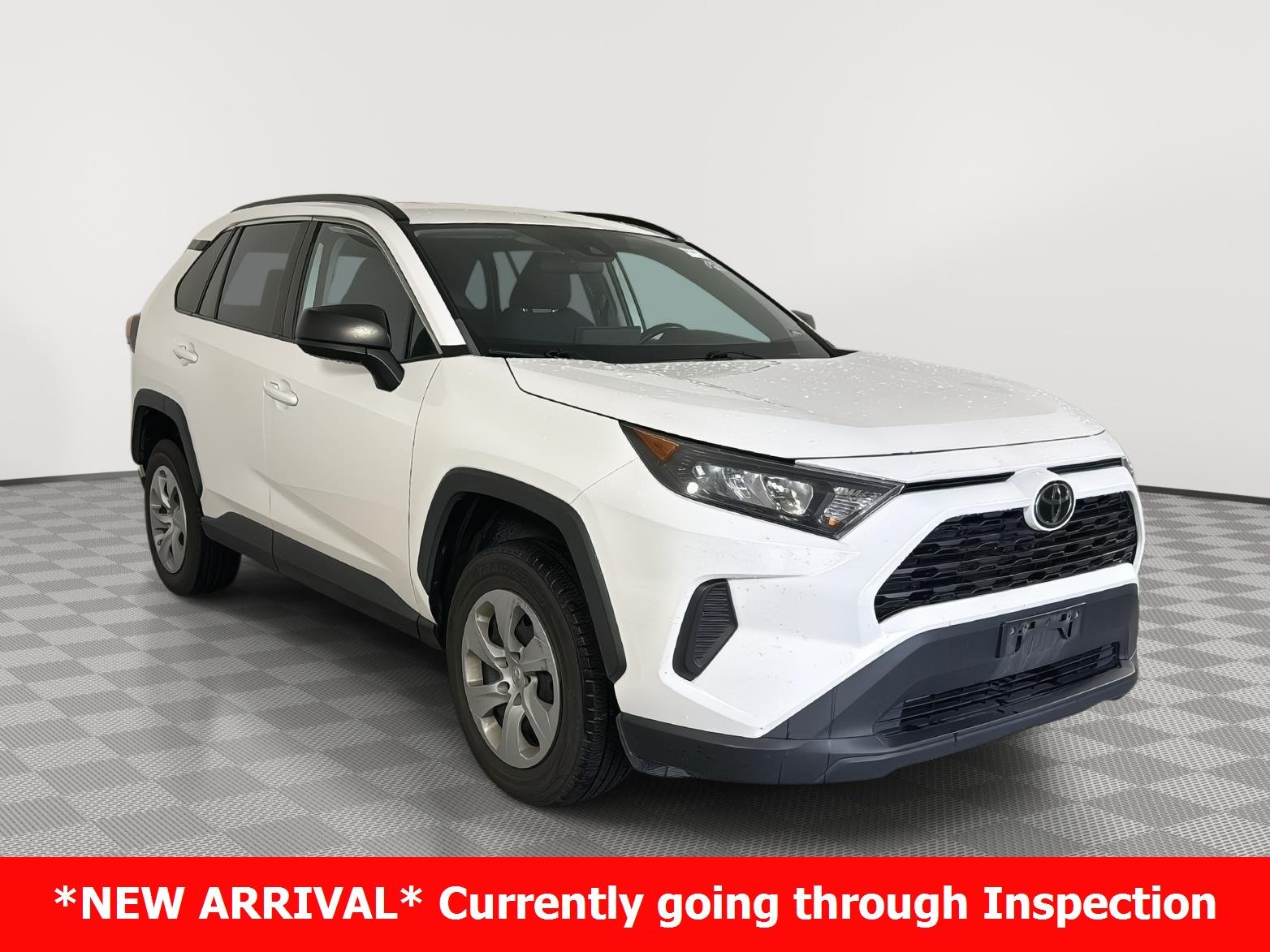 Used 2019 Super White Toyota LE image 1