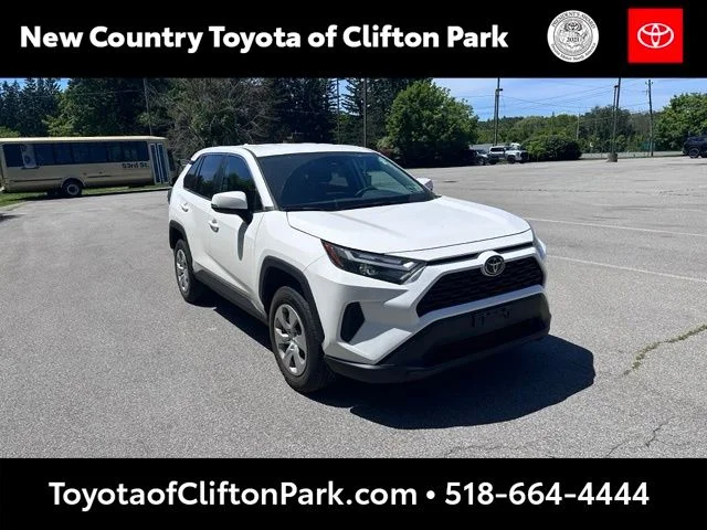 Used 2023 White Toyota LE image 1