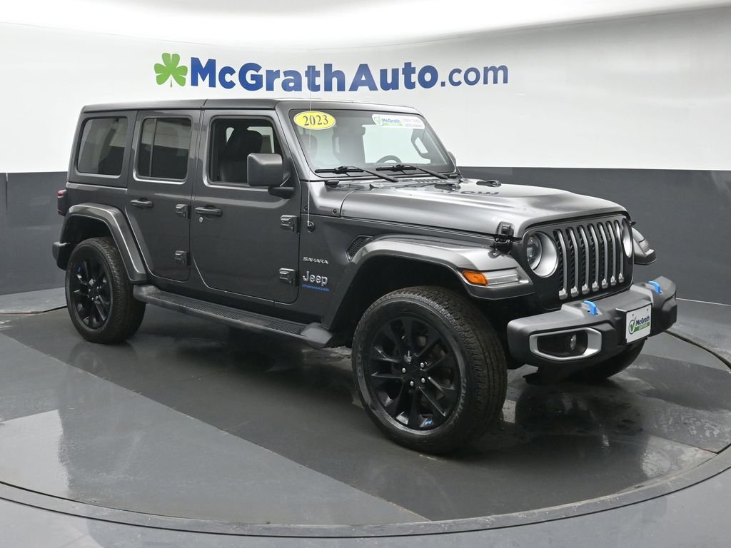 Used 2023 Jeep Wrangler 4xe Sahara 4XE with VIN 1C4JJXP67PW536827 for sale in Cedar Rapids, IA