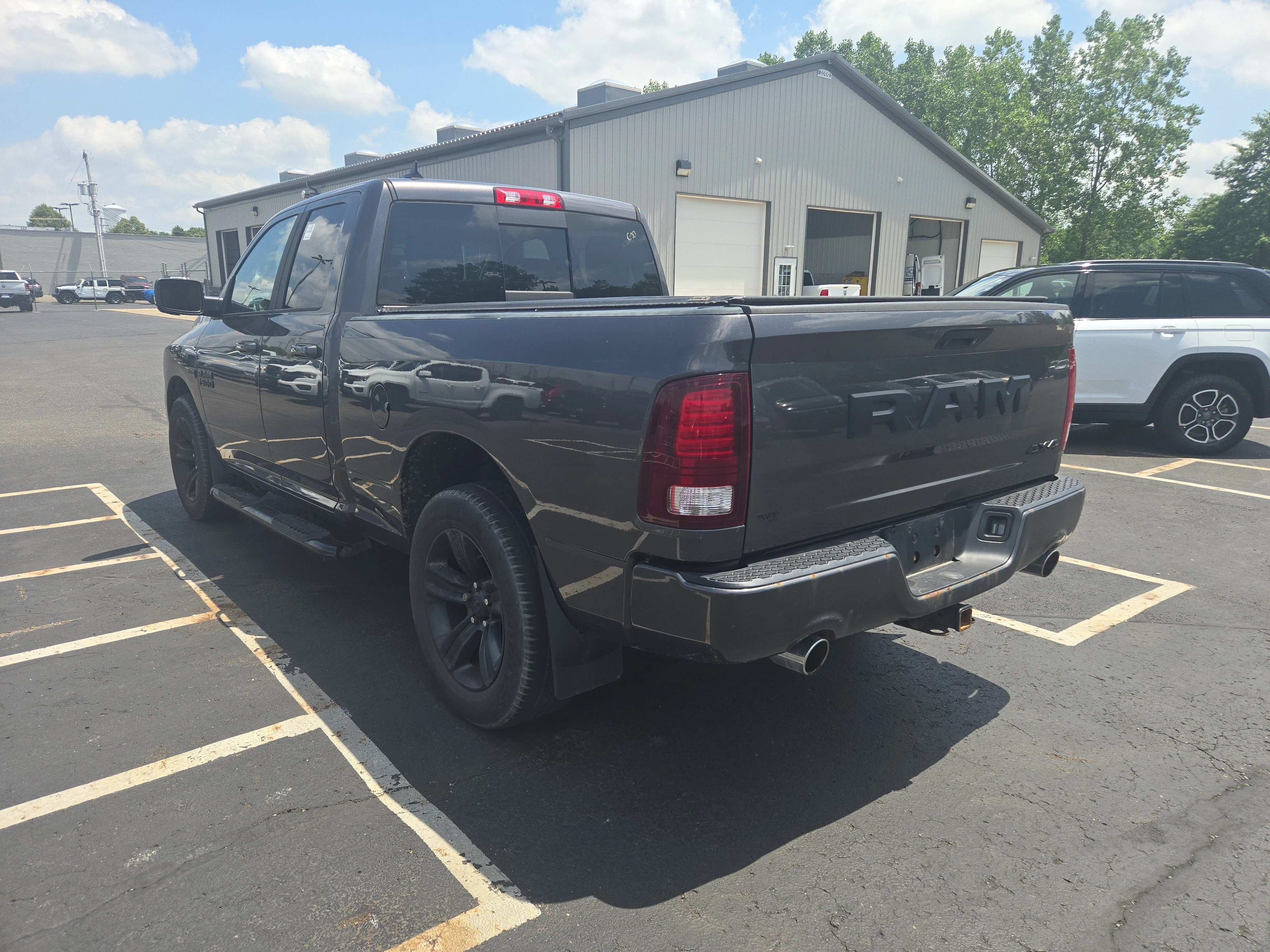 Used 2017 Granite Crystal Metallic Clearcoat Ram Night image 7