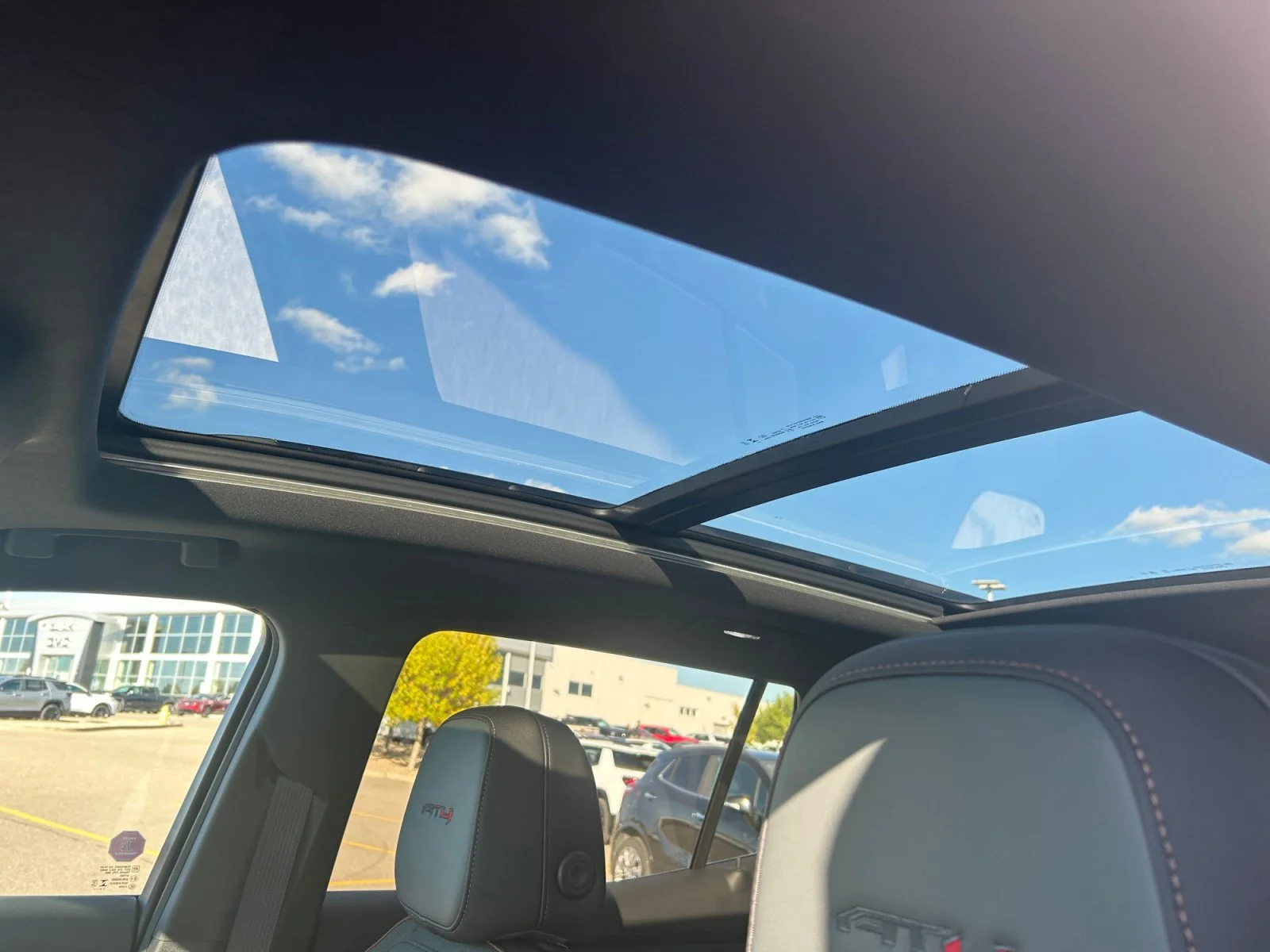 New 2027 Summit White GMC AWD AT4 image 18