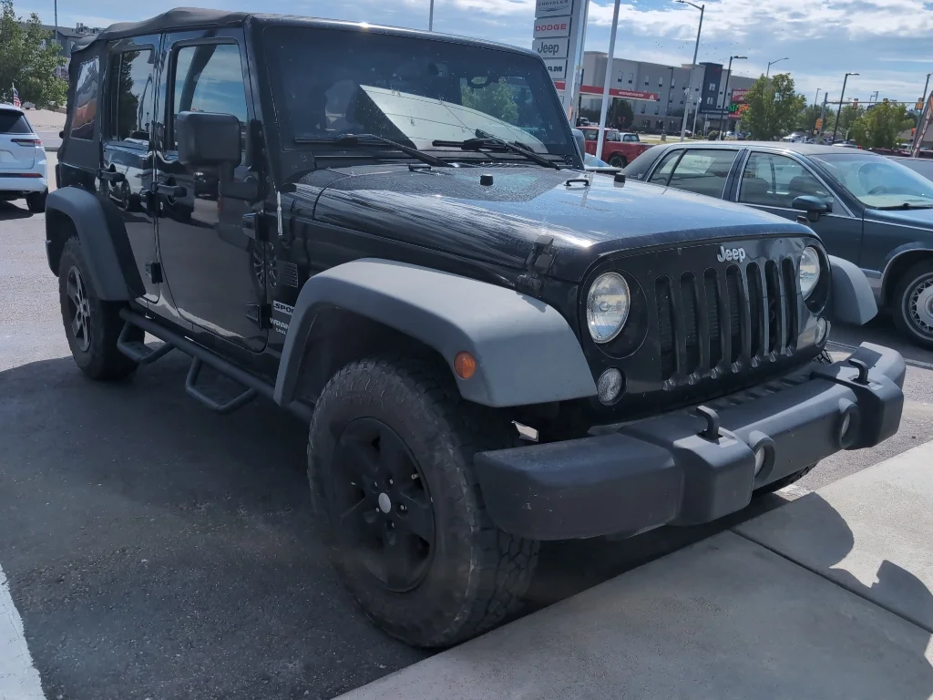 Used 2016 Black Clearcoat Jeep Sport image 2