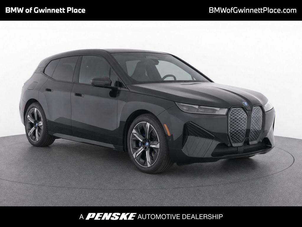 Certified Used 2024 Dark Graphite BMW xDrive50 image 1