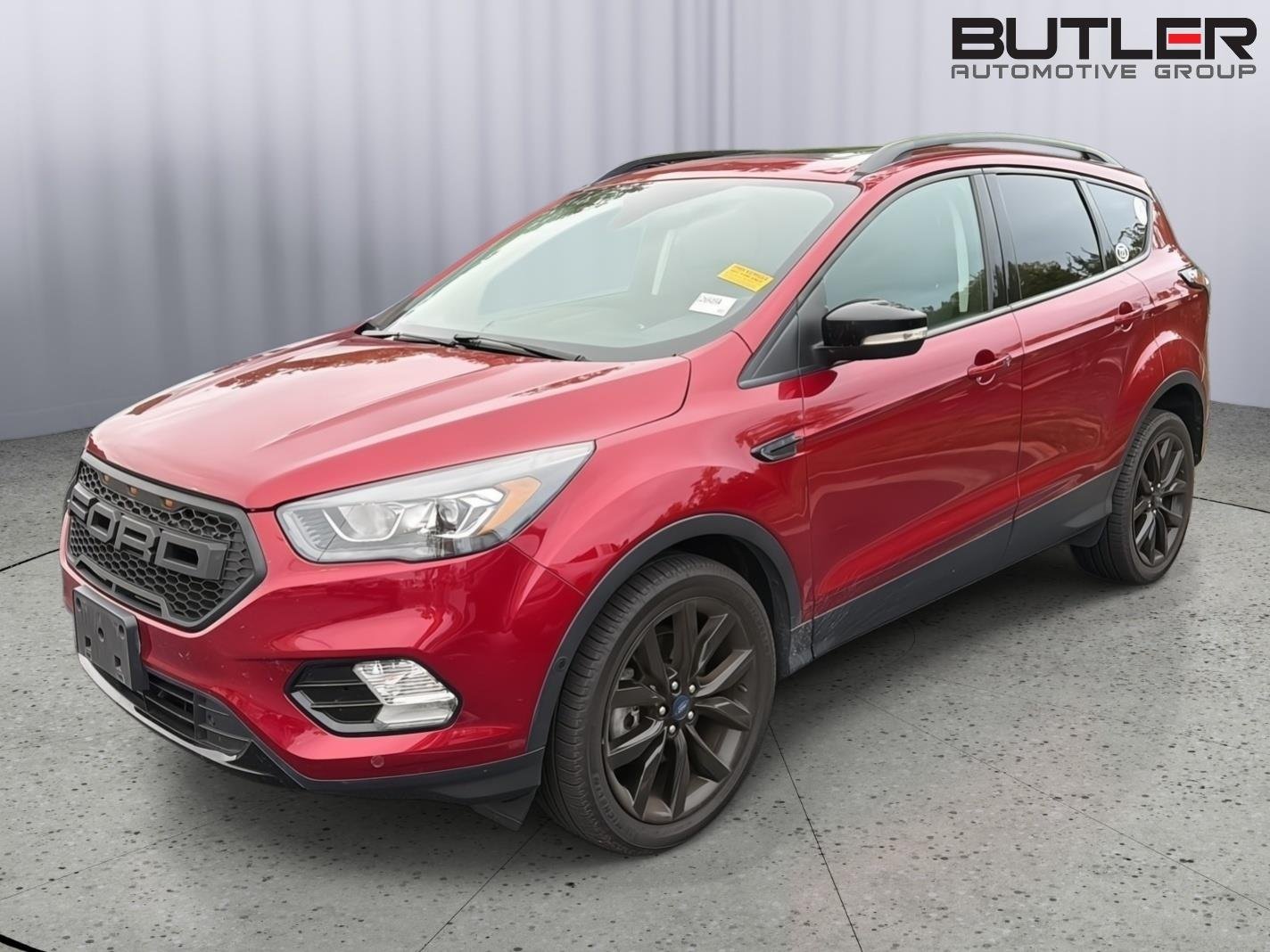 Used 2018 Ruby Red Metallic Tinted Clearcoat Ford Titanium image 1