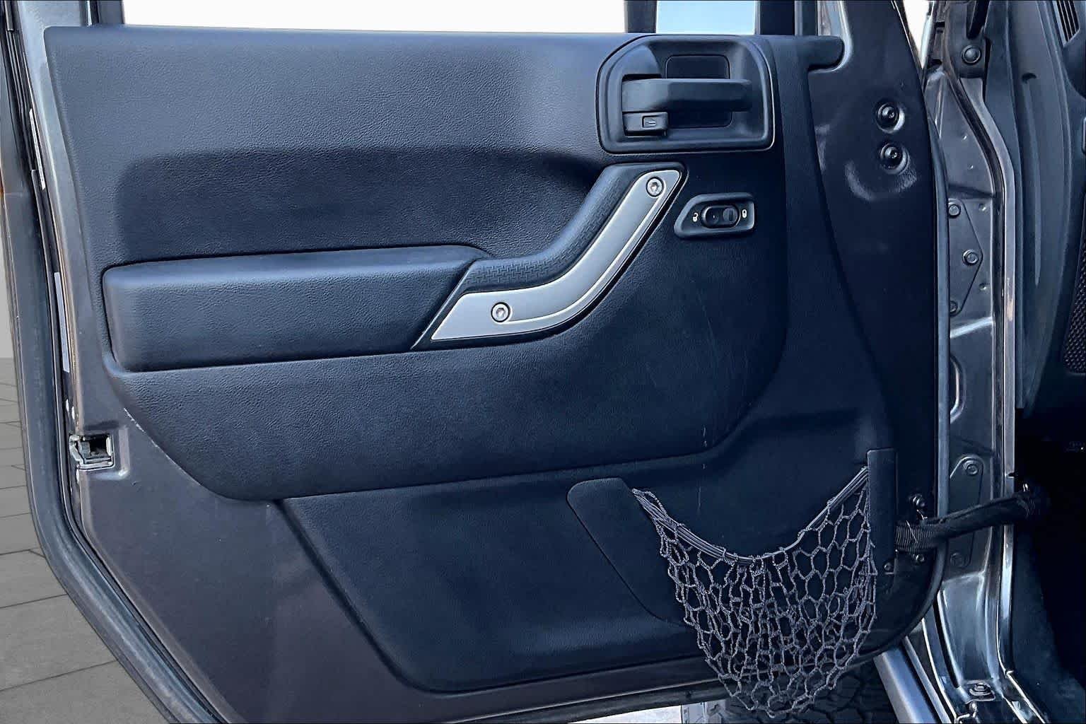 Used 2016 Granite Crystal Metallic Clearcoat Jeep Rubicon image 24