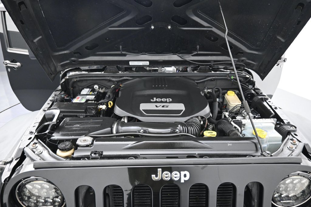 Used 2014 Black Clearcoat Jeep Unlimited Sport image 31