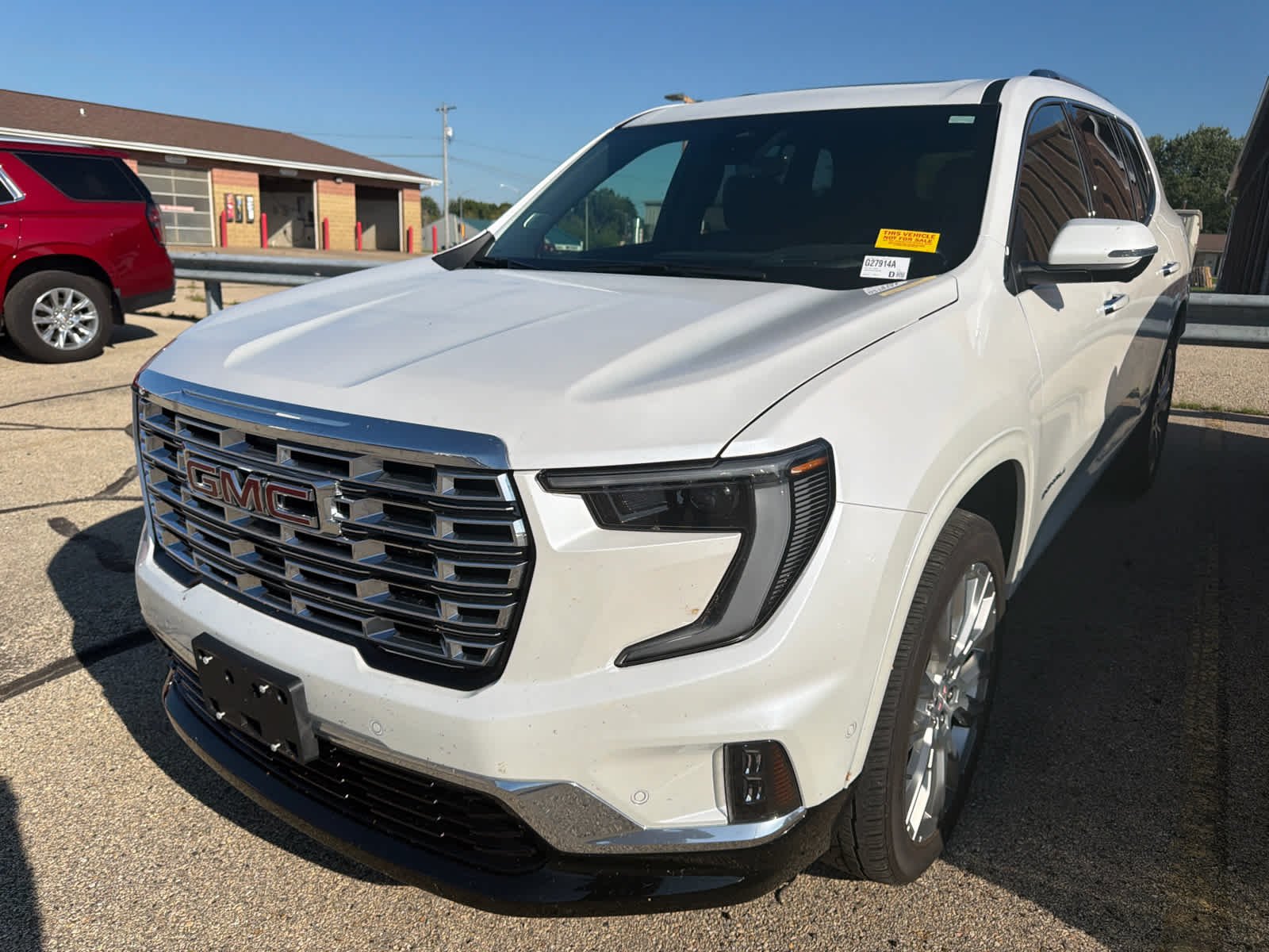 Used 2024 White Frost Tricoat GMC Denali image 1