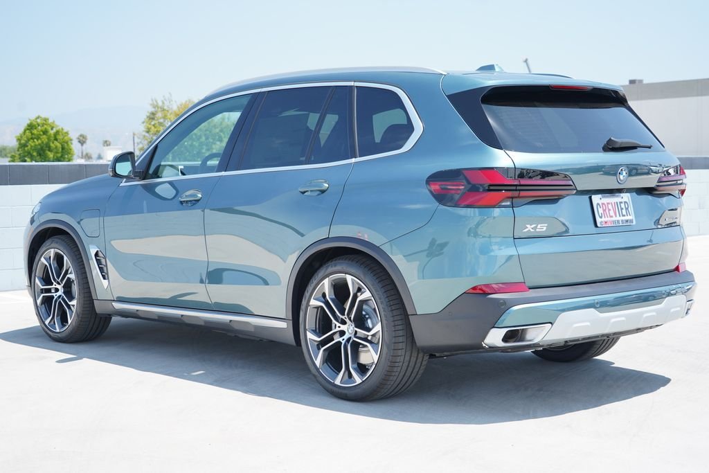 New 2026 Blue Ridge Mountain Metallic BMW xDrive50e image 8