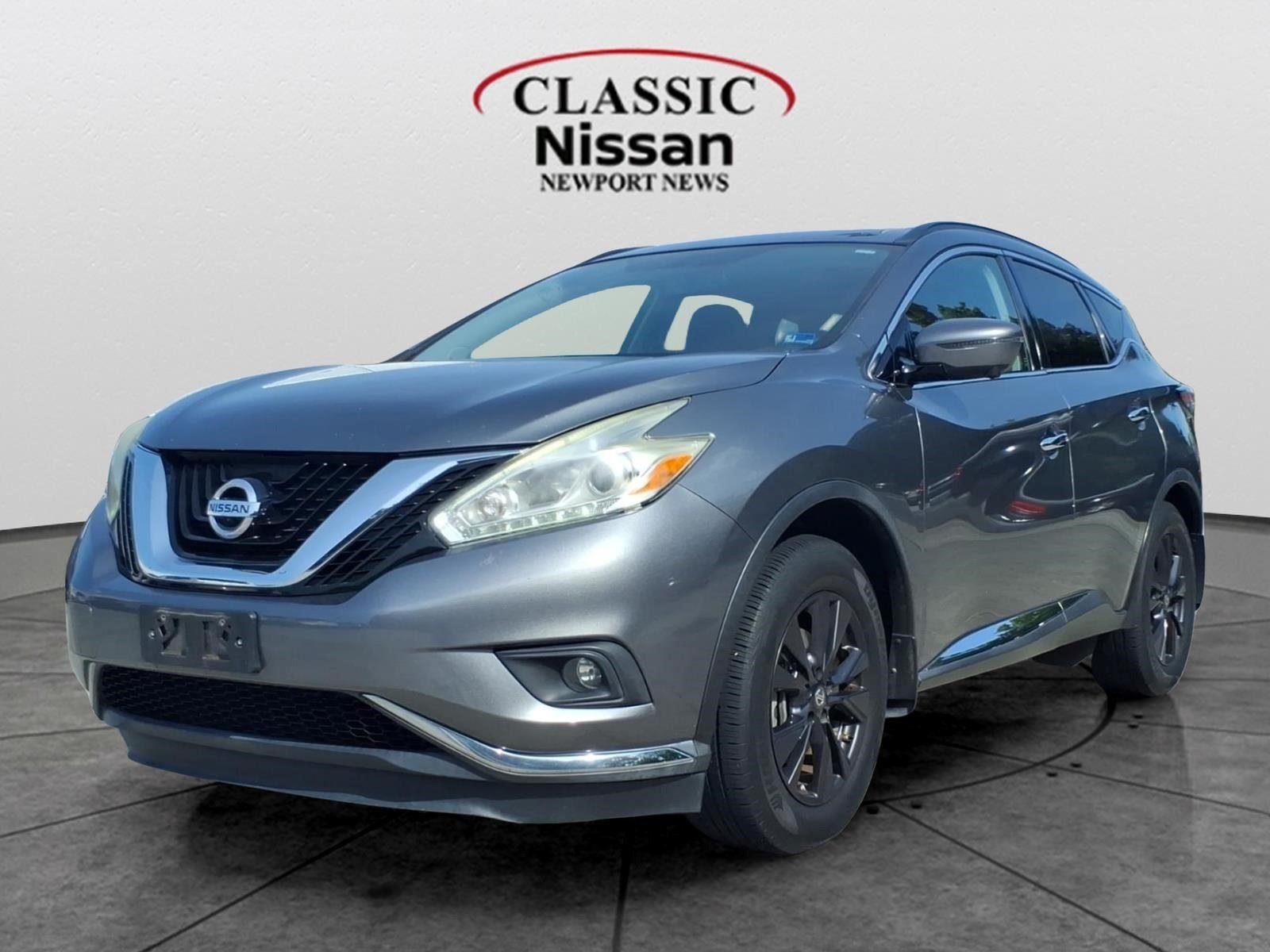 Used 2017 Gun Metallic Nissan SV image 1