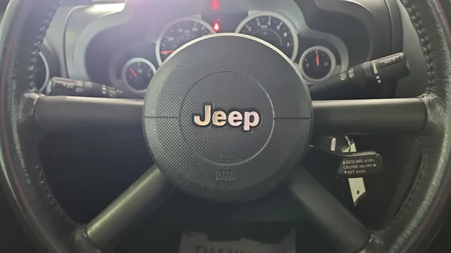 Used 2009 Green Metallic Jeep Rubicon image 17