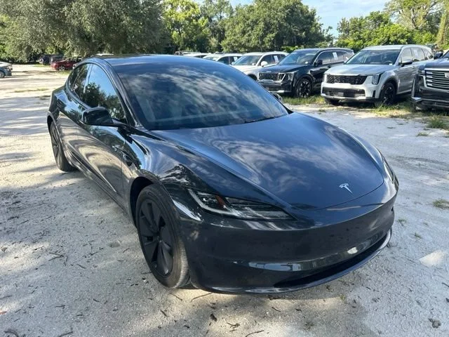 Used 2024 Stealth Gray Tesla Base image 1