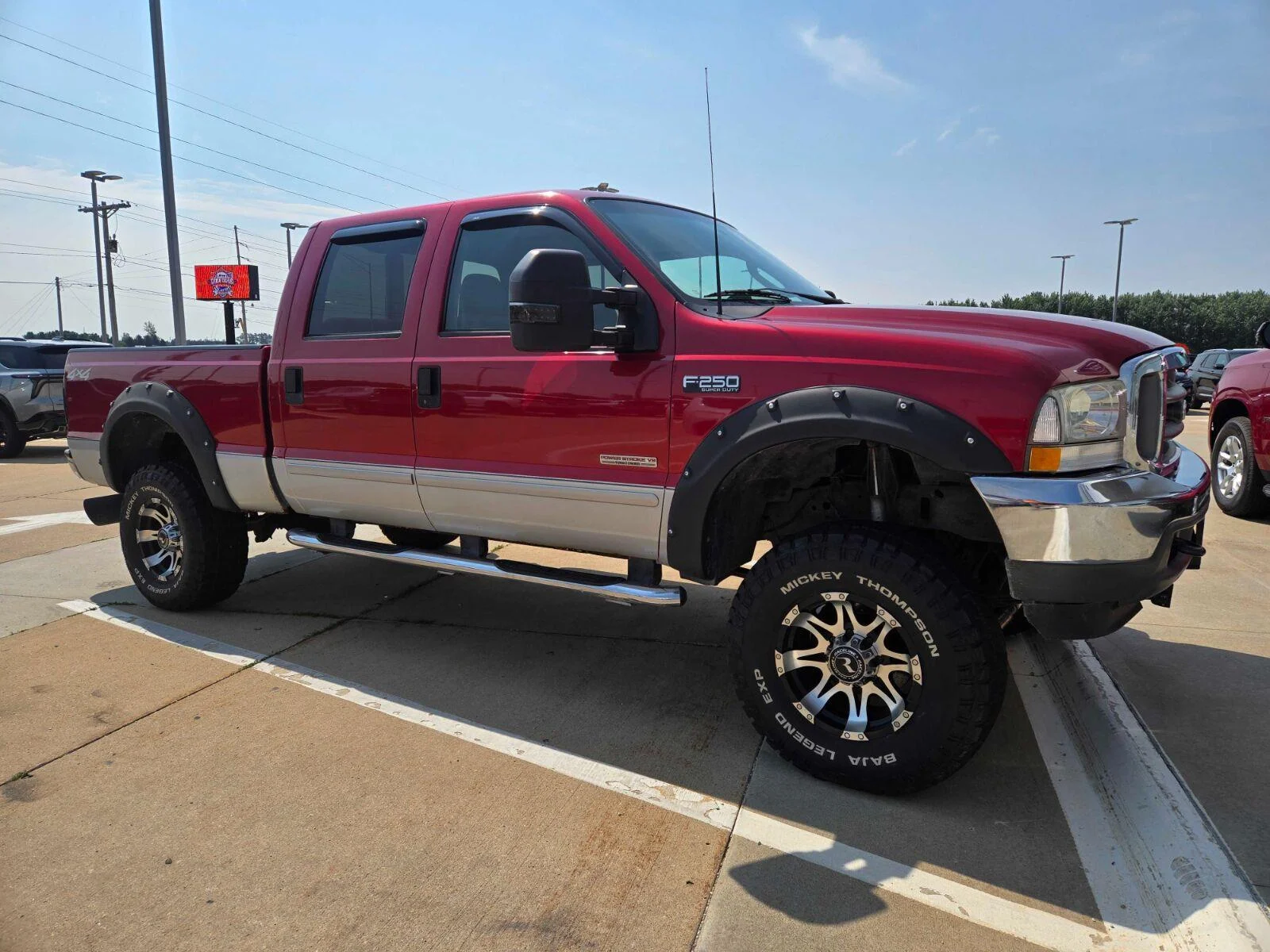Used 2003 Red Ford Lariat image 1