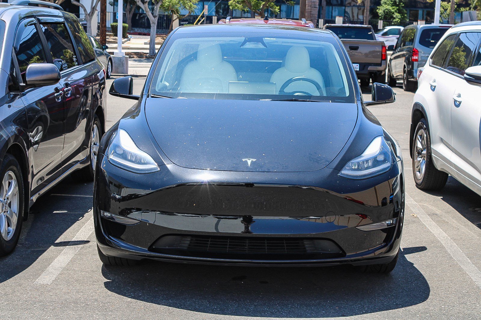 Used 2024 Tesla Model Y Long Range with VIN 7SAYGDEE4RF066949 for sale in Long Beach, CA