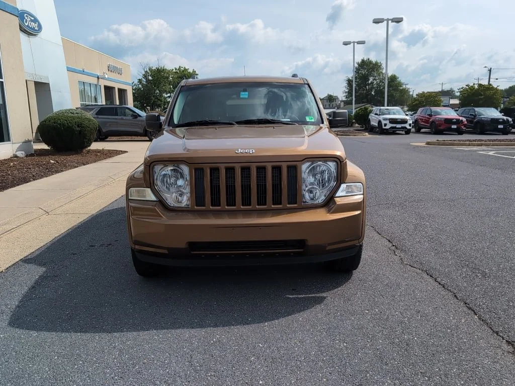 Used 2011 Brown Jeep Sport image 2