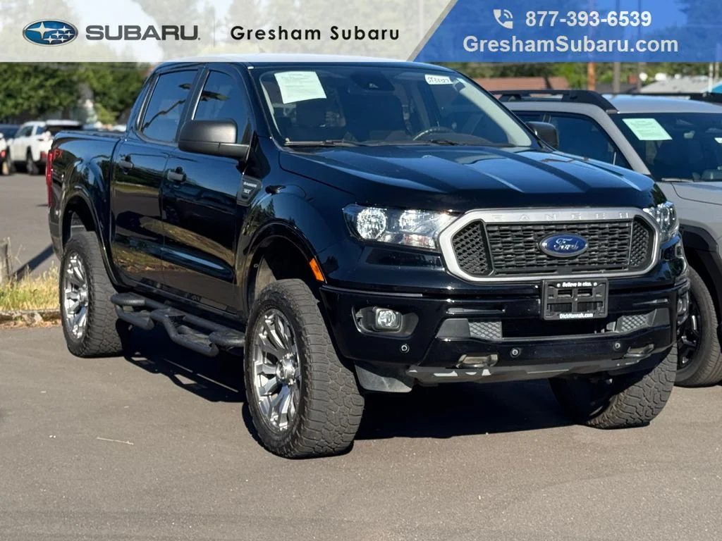 Used 2019 Shadow Black Ford XLT image 1