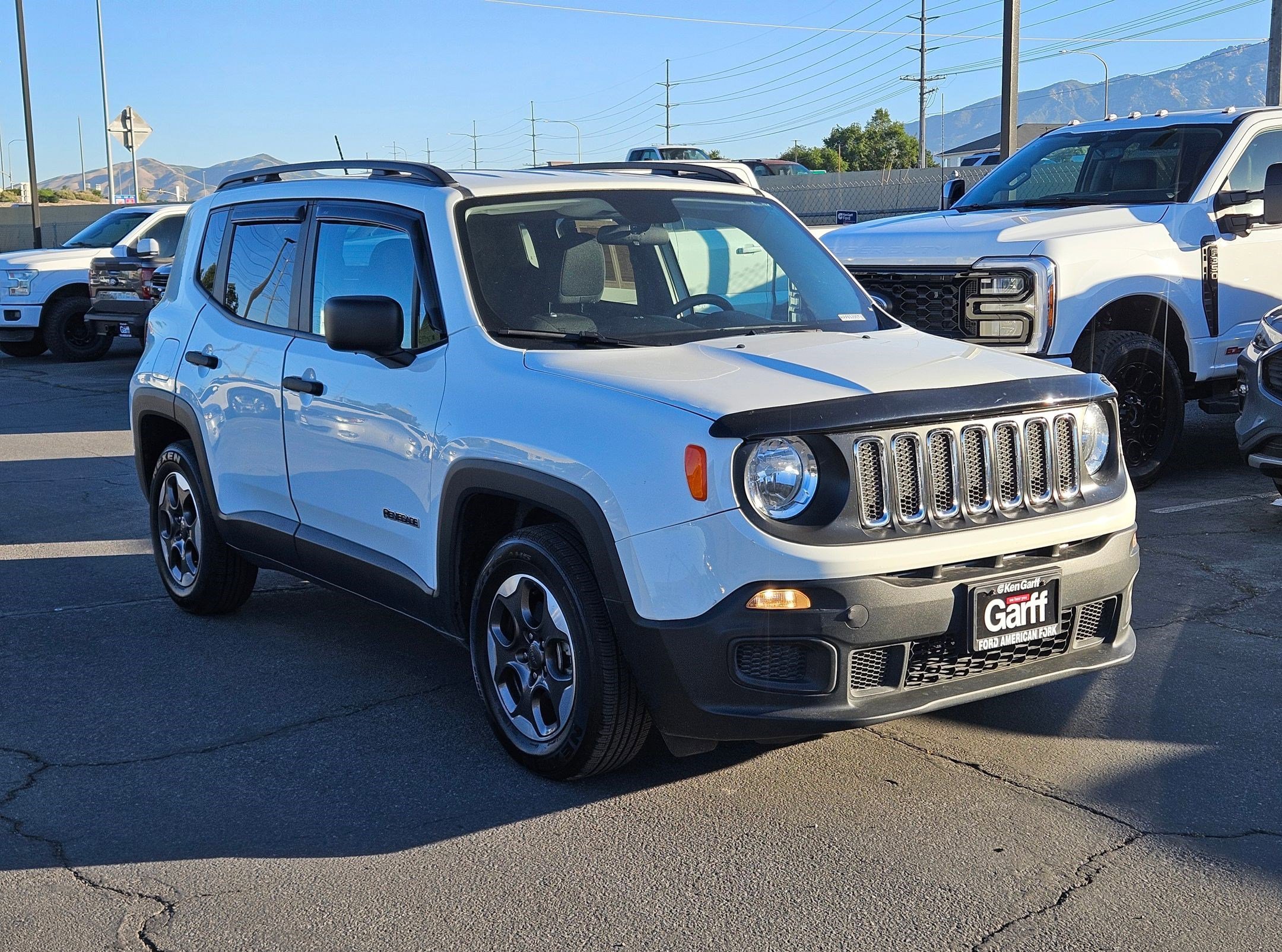 Used 2017 Alpine White Jeep Sport image 13
