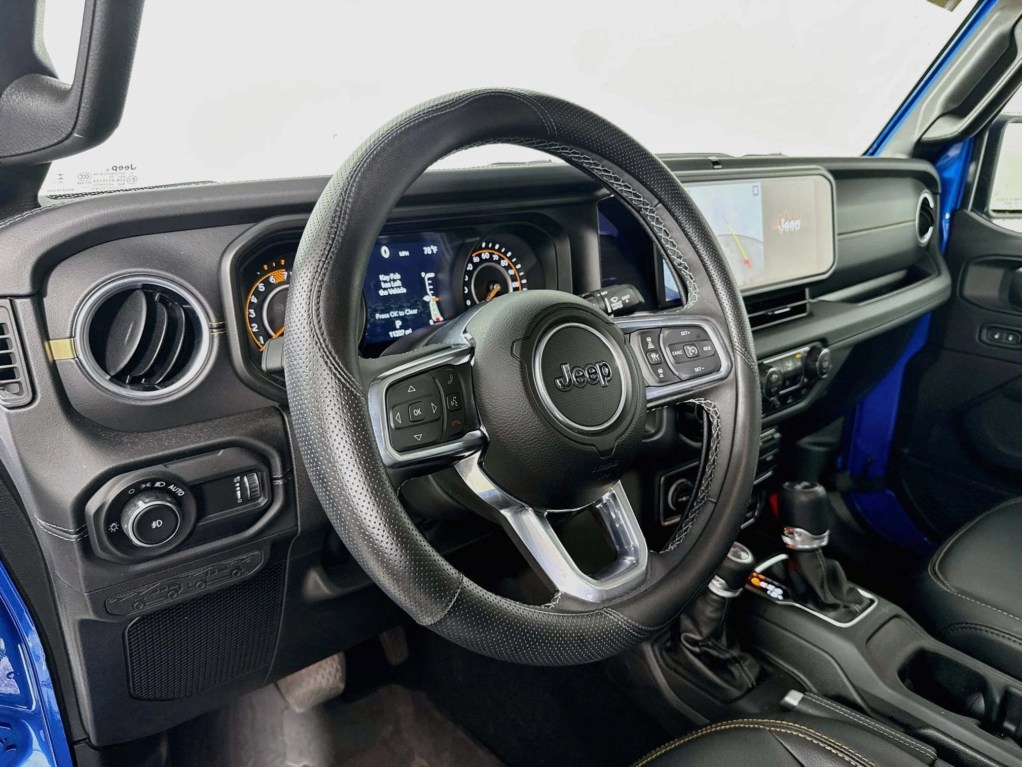 Used 2025 Hydro Blue Pearlcoat Jeep Sahara image 9