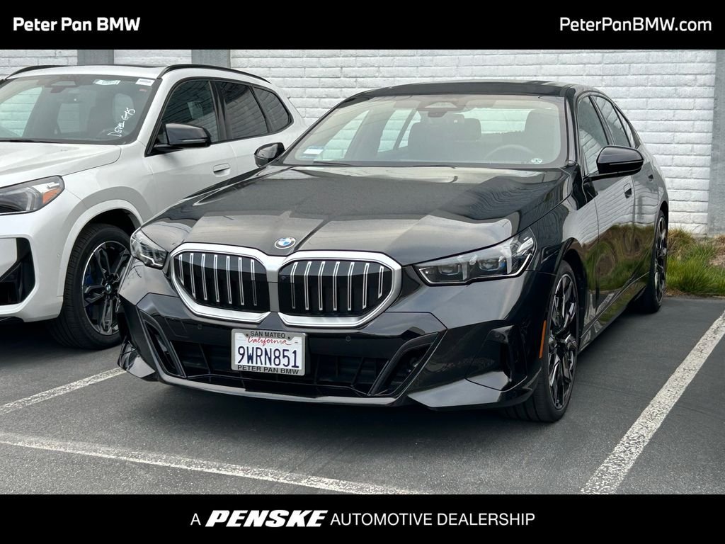 Used 2026 Black Sapphire Metallic BMW 540i xDrive image 1