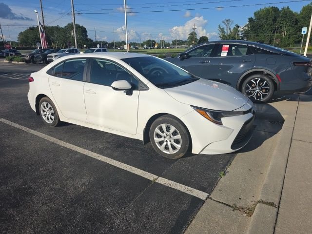 Used 2025 White Toyota LE image 4