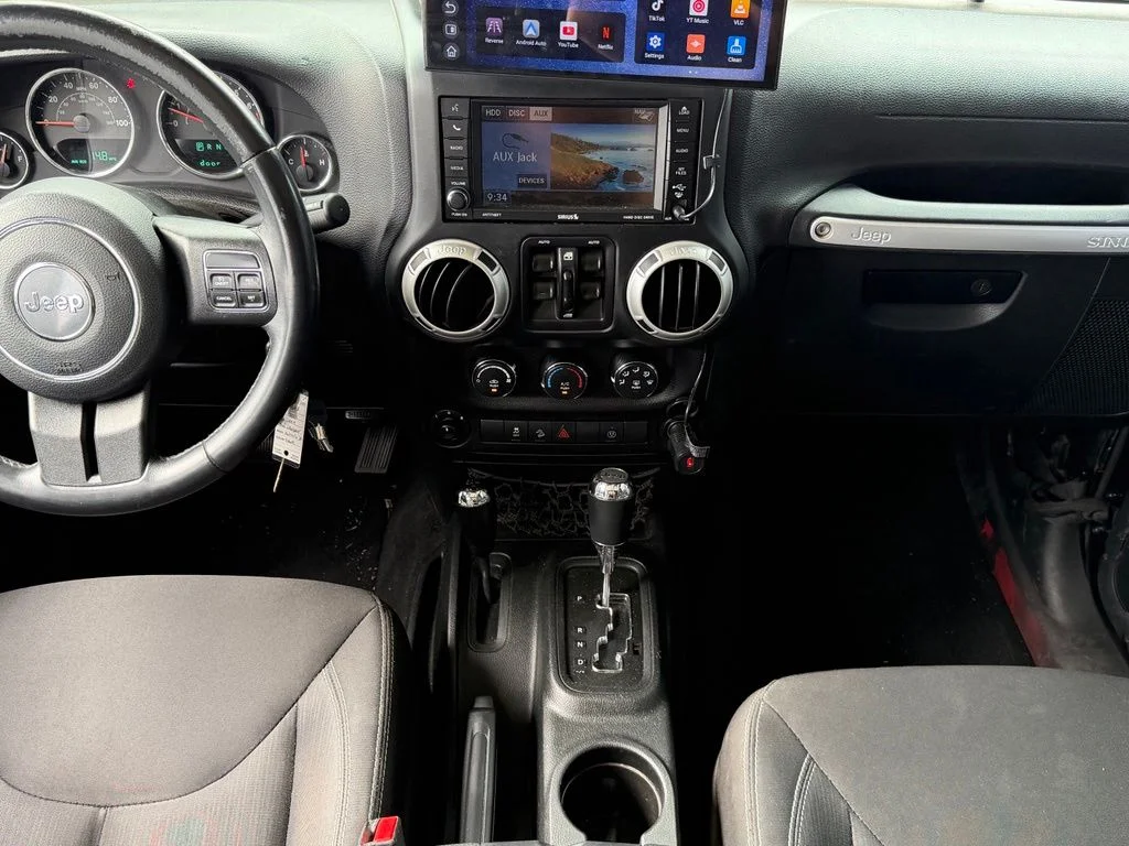 Used 2018 Black Jeep Unlimited Sahara image 10