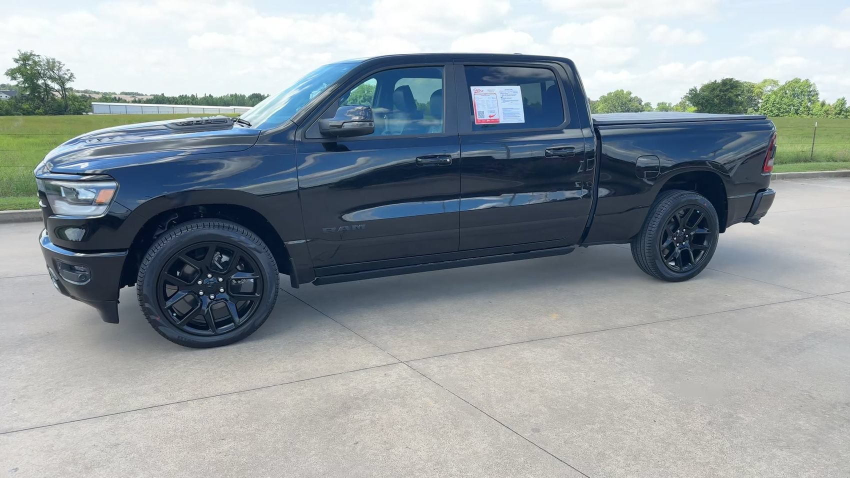 Used 2023 Diamond Black Crystal Pearlcoat Ram Laramie image 4