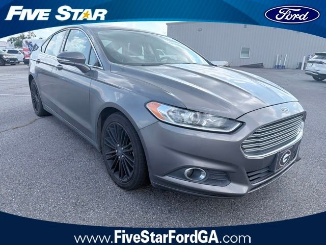 Used 2014 Sterling Gray Metallic Ford SE image 1