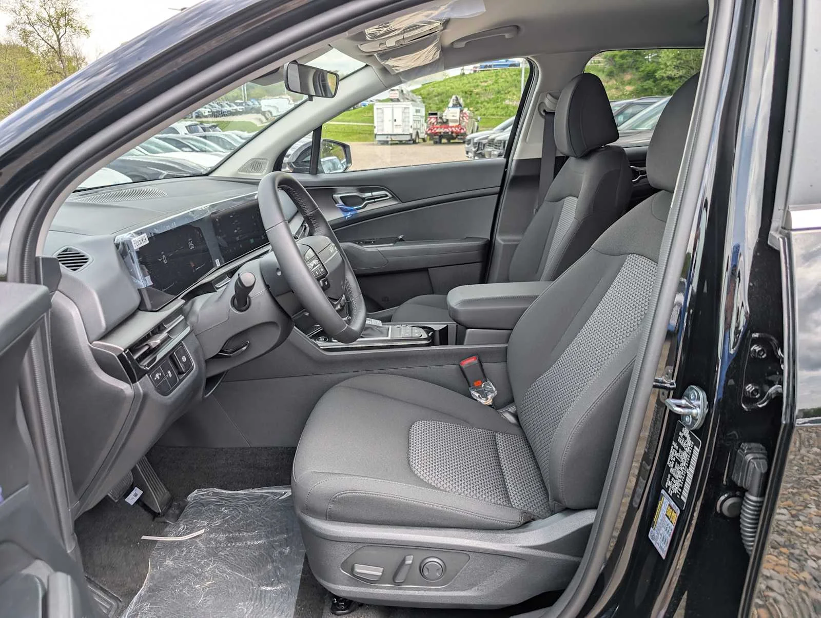 New 2026 Ebony Black Kia LX image 4