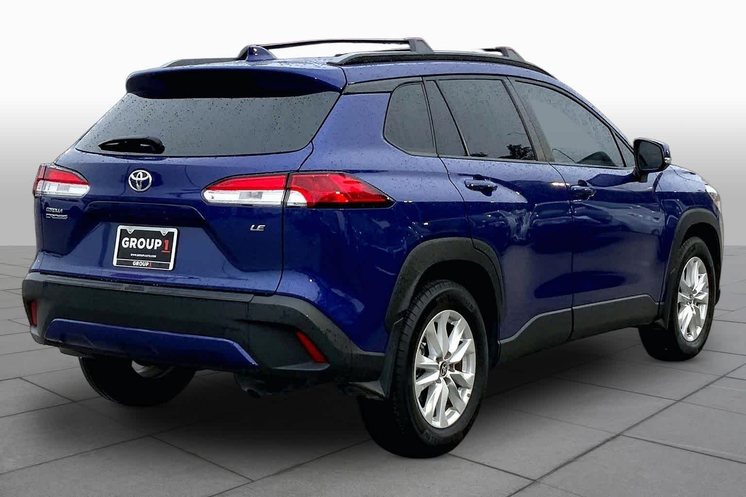 Used 2024 Blue Crush Metallic Toyota LE image 13