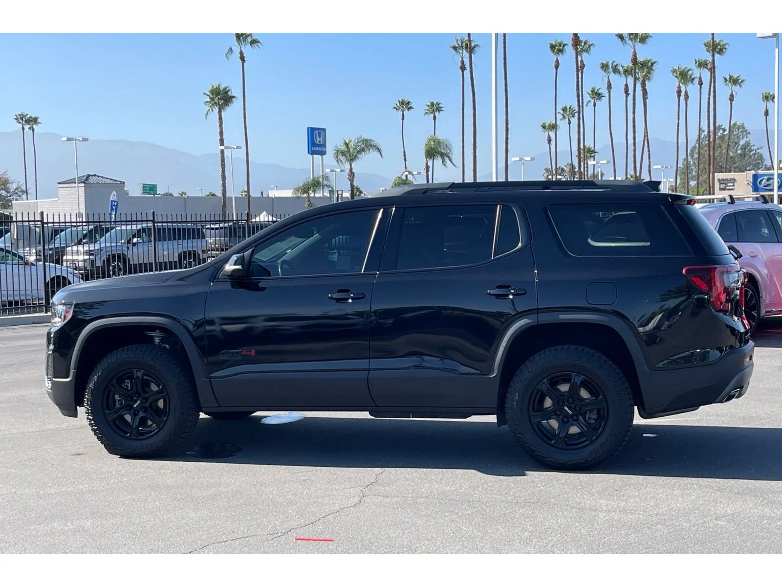 Used 2021 Ebony Twilight Metallic GMC AT4 image 3