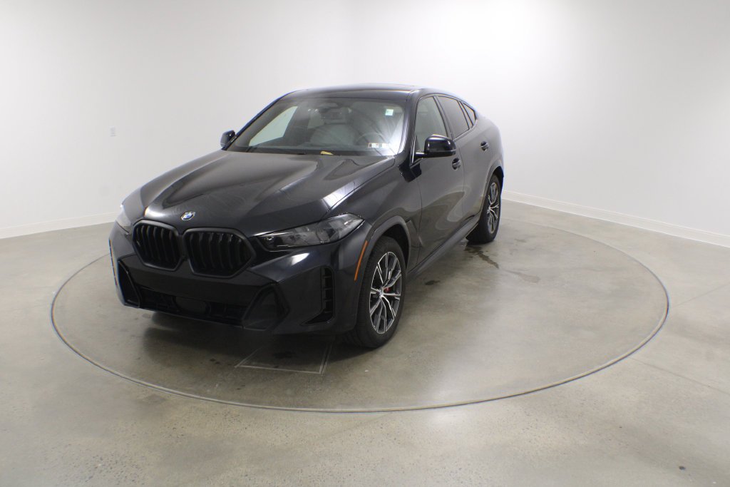 Used 2024 Carbon Black Metallic BMW xDrive40i image 1