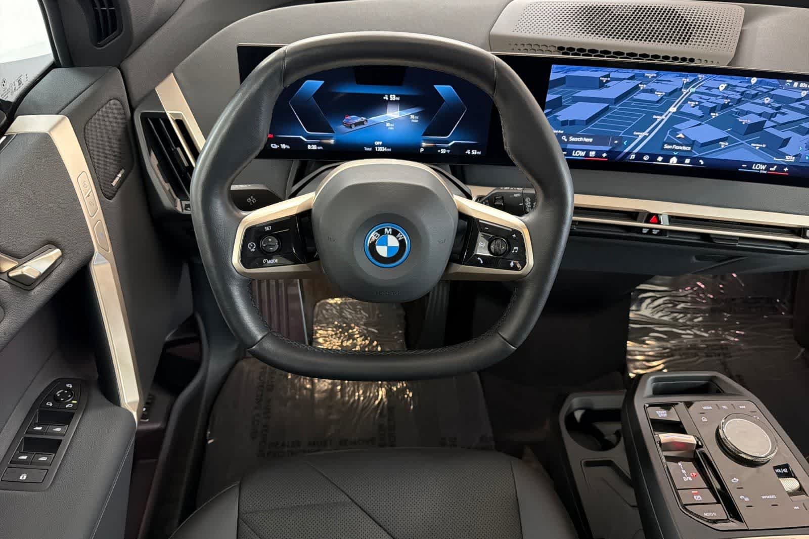Used 2024 Black Sapphire Metallic BMW xDrive50 image 14