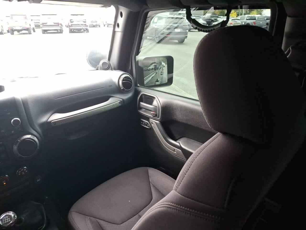 Used 2013 Black Clearcoat Jeep Sport image 11