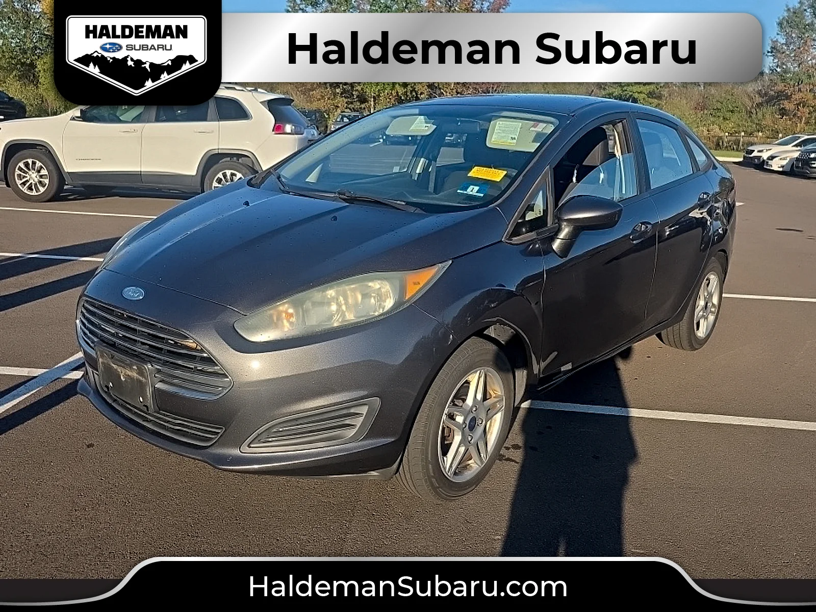 Used 2017 Magnetic Metallic Ford SE image 1