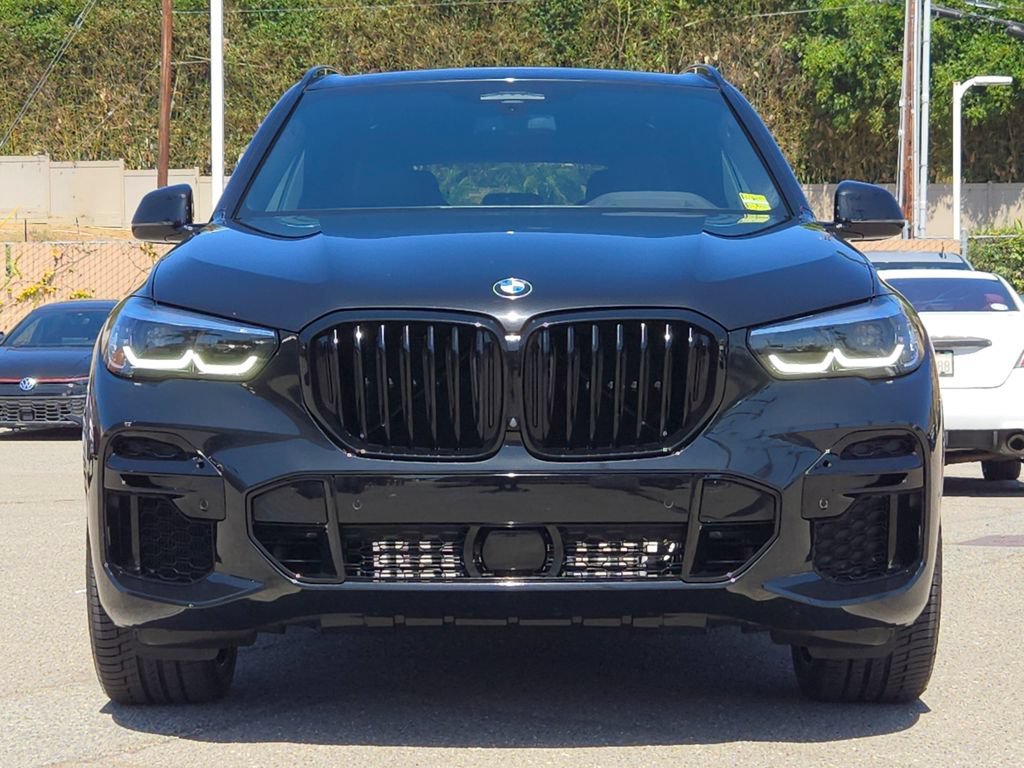 Used 2023 Black Sapphire Metallic BMW sDrive40i image 2