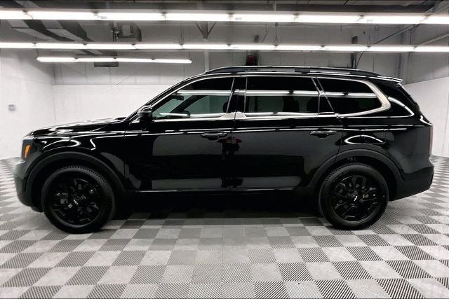 Used 2024 Ebony Black Kia SX-Prestige X-Pro image 15