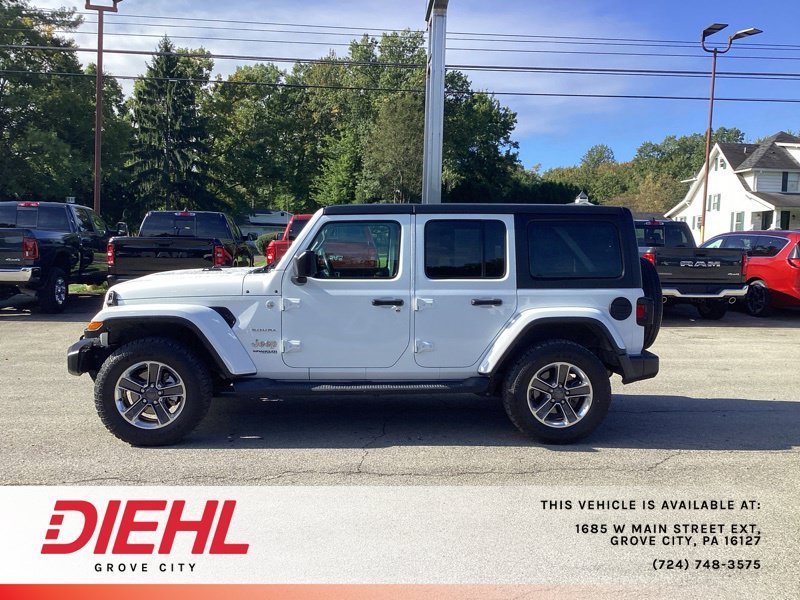 Used 2019 White Jeep Unlimited Sahara image 4