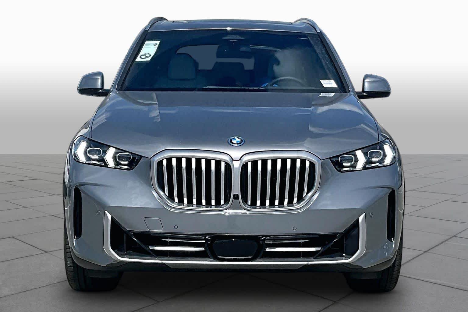 Used 2026 Skyscraper Grey Metallic BMW xDrive50e image 3