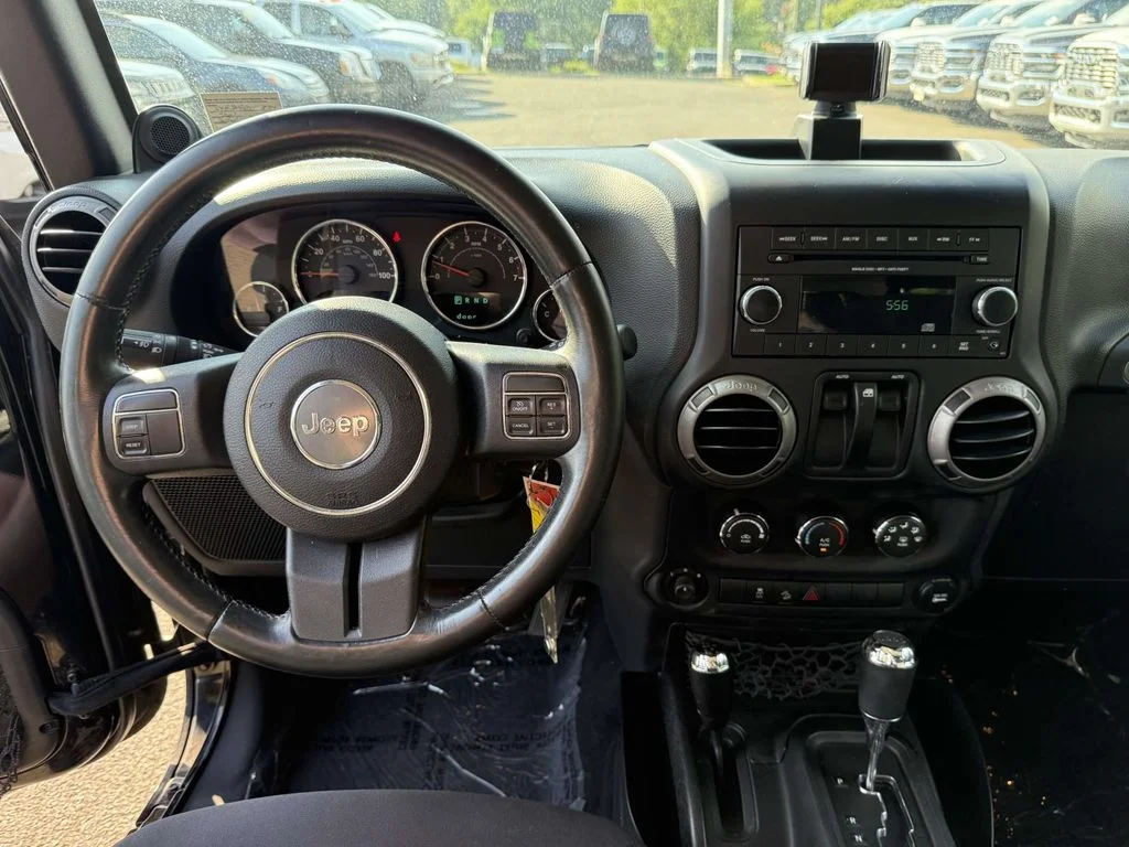 Used 2014 Black Jeep Sport image 16