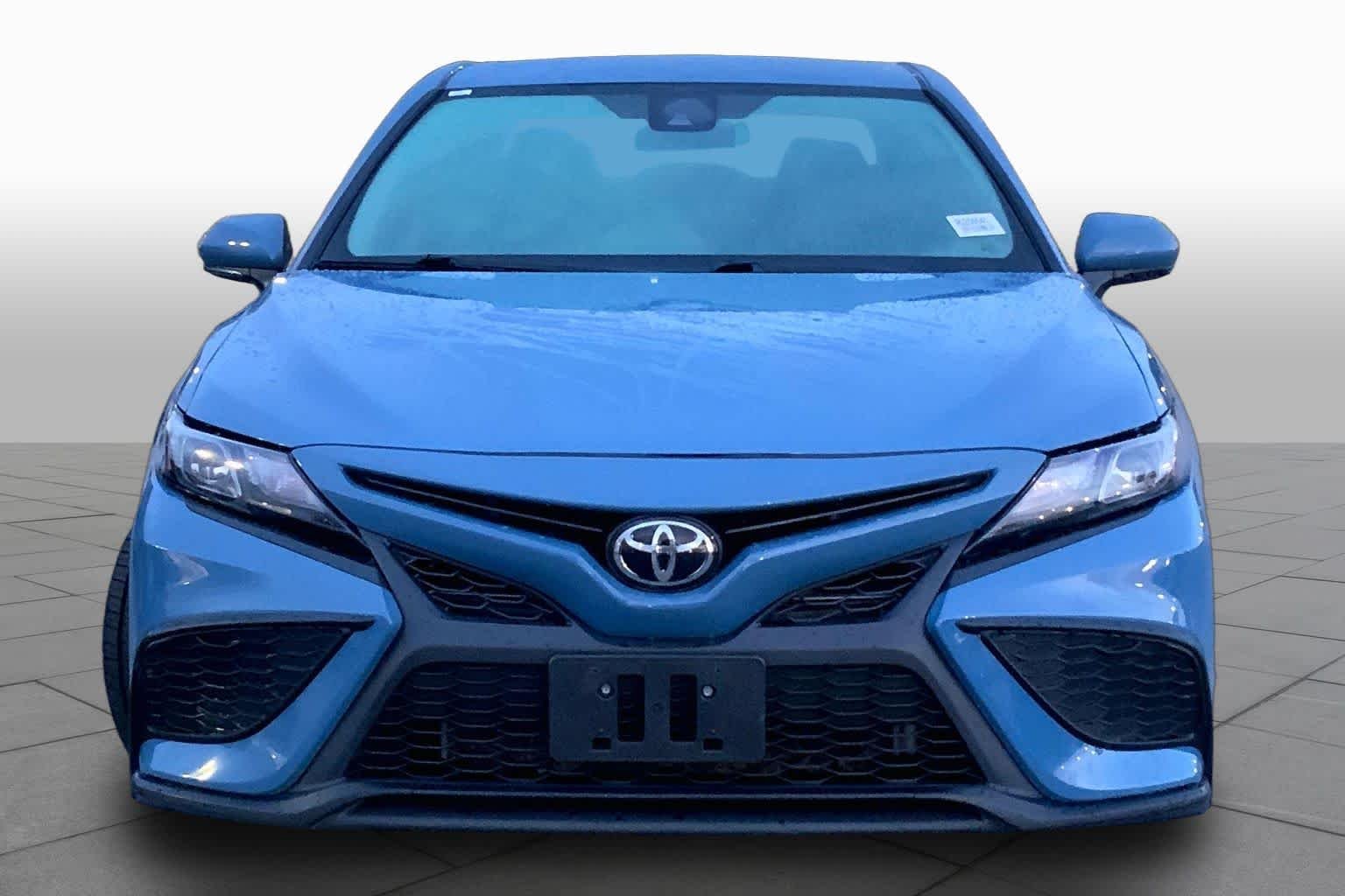 Used 2024 Cavalry Blue Toyota SE image 4