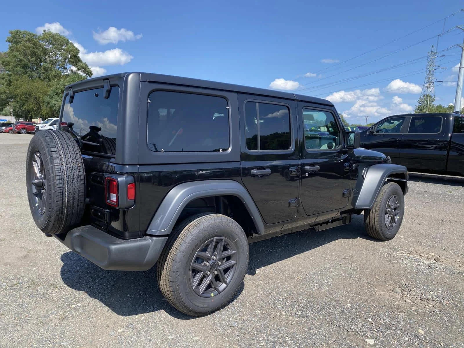 New 2026 Black Clearcoat Jeep Sport S image 3
