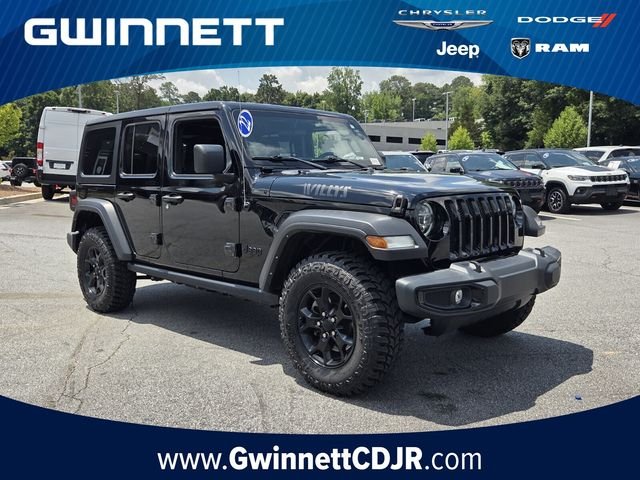 Used 2022 Black Jeep Unlimited Willys image 1