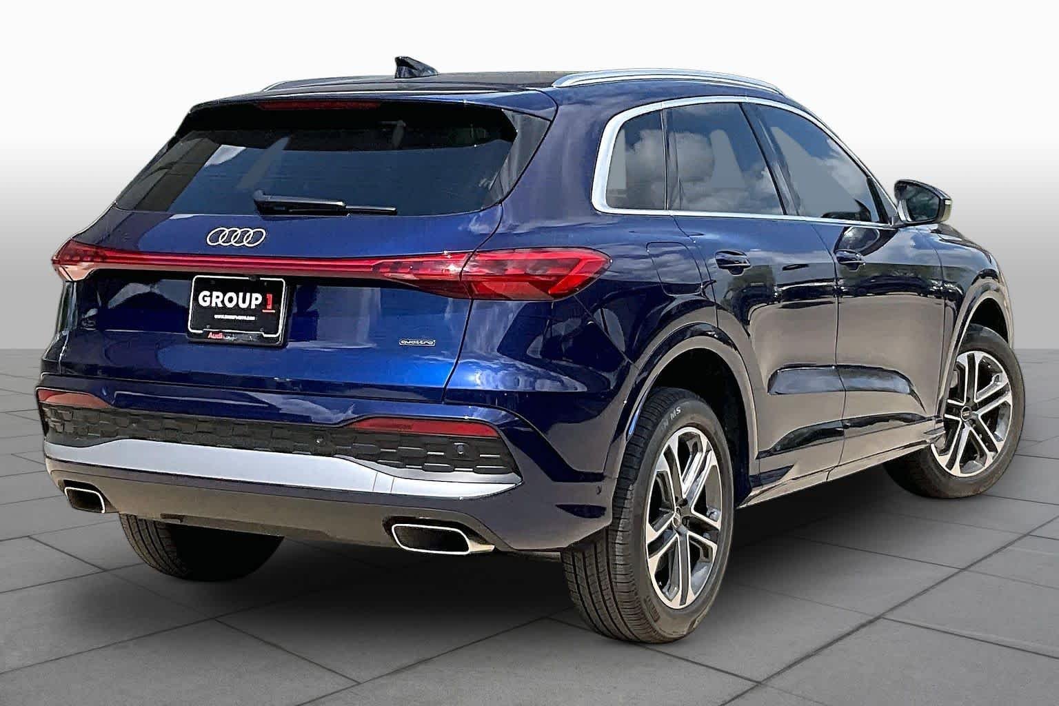 Used 2025 Navarra Blue Metallic Audi Premium image 12