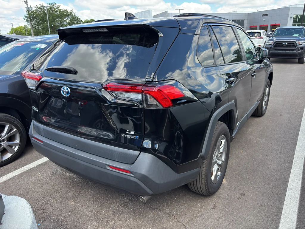 Used 2024 Midnight Black Metallic Toyota Hybrid LE image 4