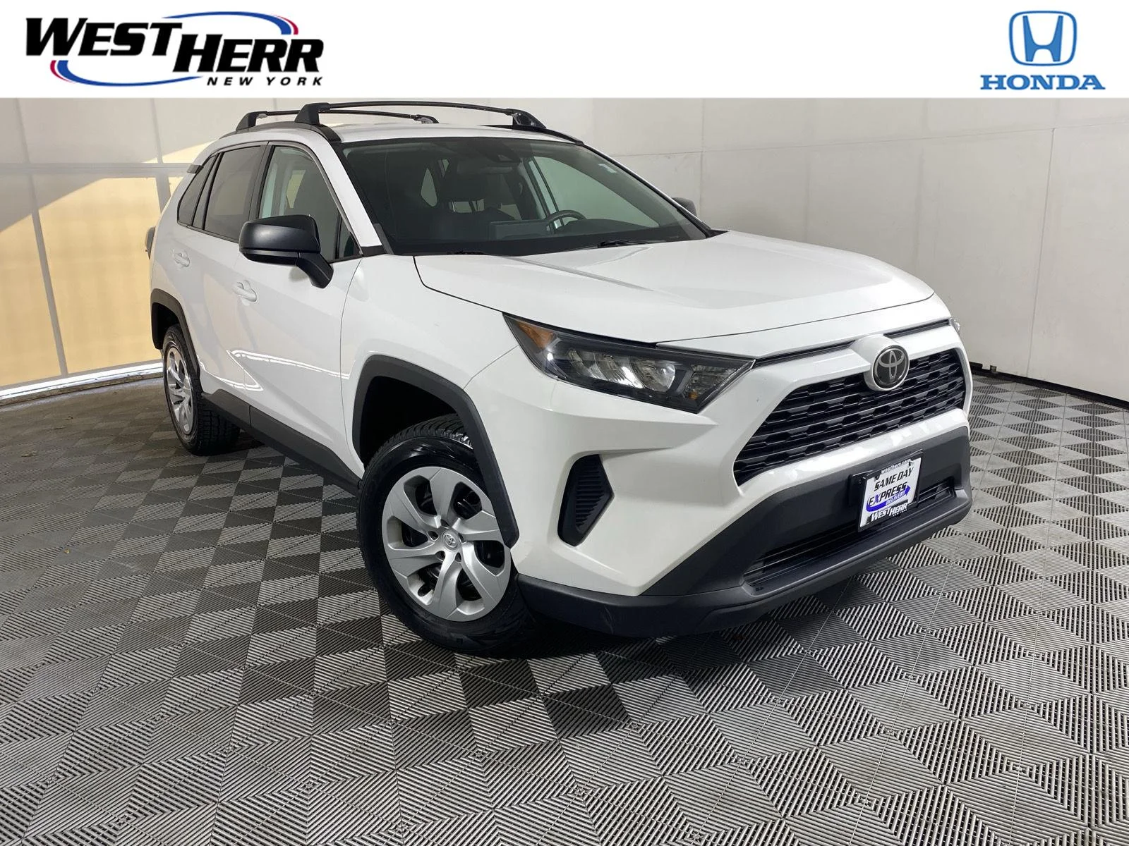 Used 2021 Super White Toyota LE image 1