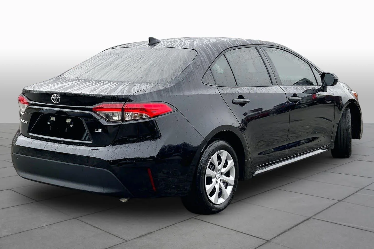 Used 2025 Midnight Black Metallic Toyota LE image 24
