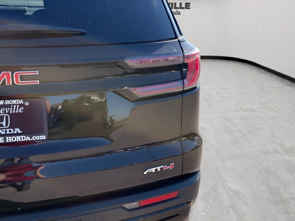 Used 2024 Ebony Twilight Metallic GMC AT4 image 7